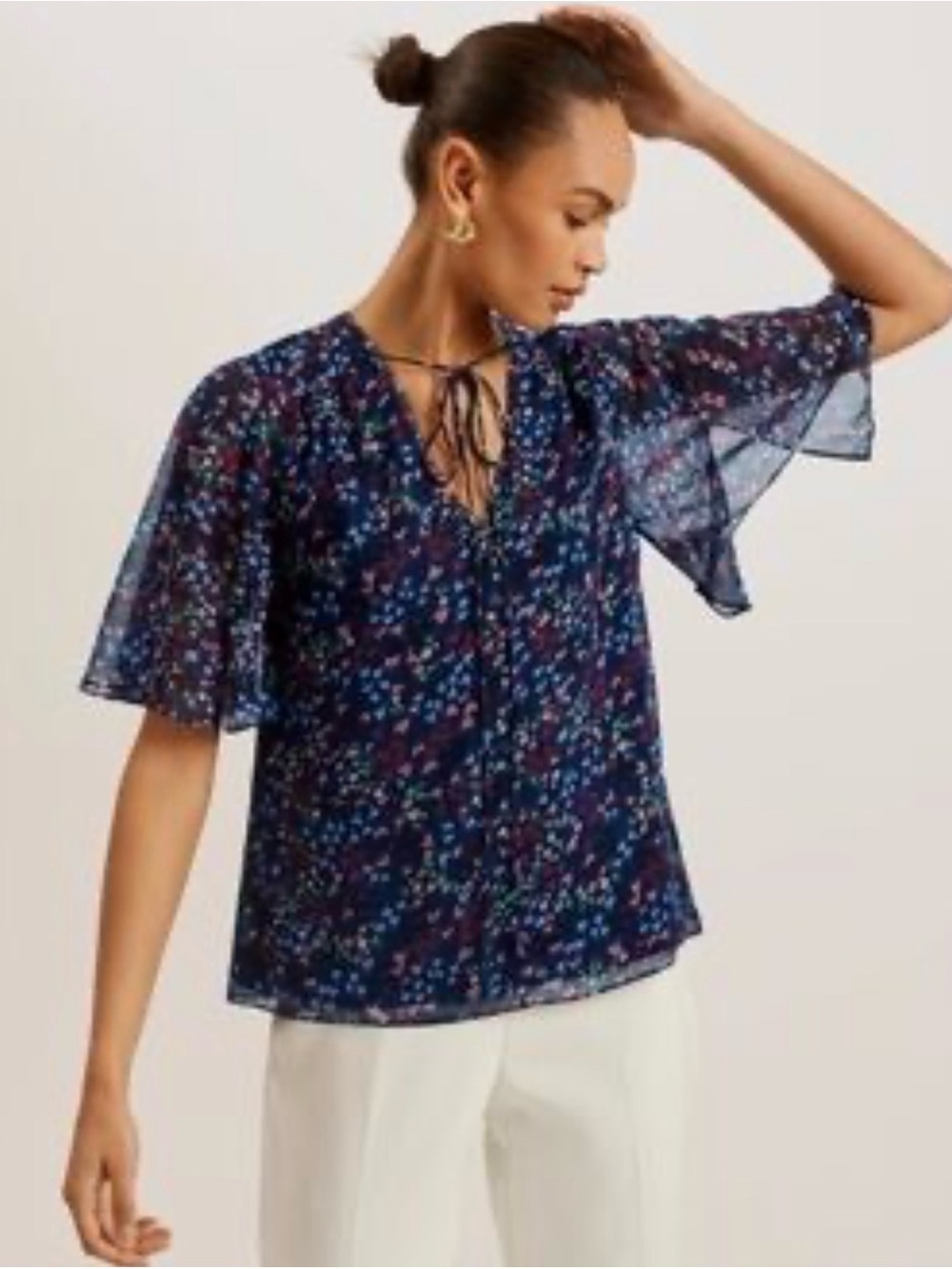 Ted Baker Navy Split Sleeve Top with Neck Tie Blouse
Size 3
MSRP $150
NWT